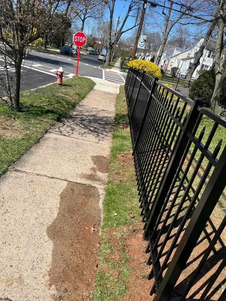 Aluminum Fence Along a Sloped Path