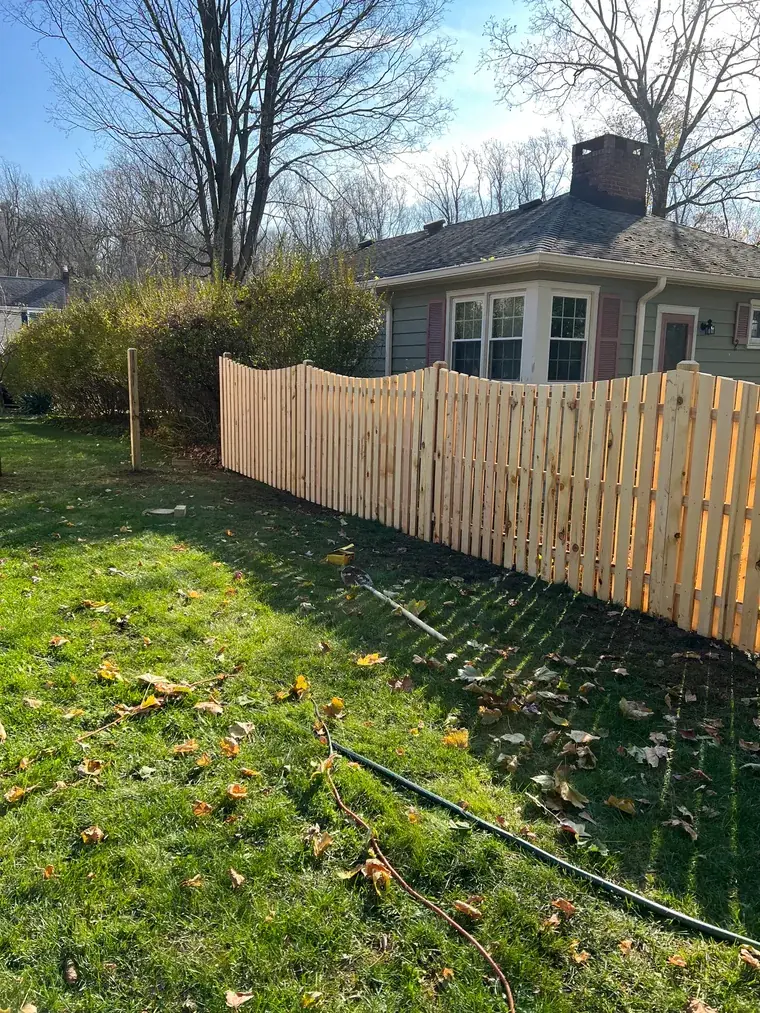 Cedar Fence Behind the House